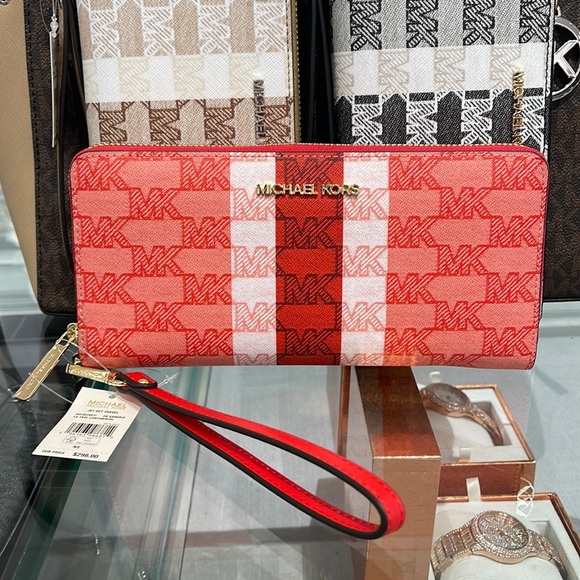 MICHAEL KORS Leather Continental Phone Holder Wristlet Wallet 
Dark Sungria
NWT - Picture 16 of 16